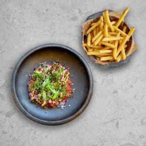 Raw beef with fries.